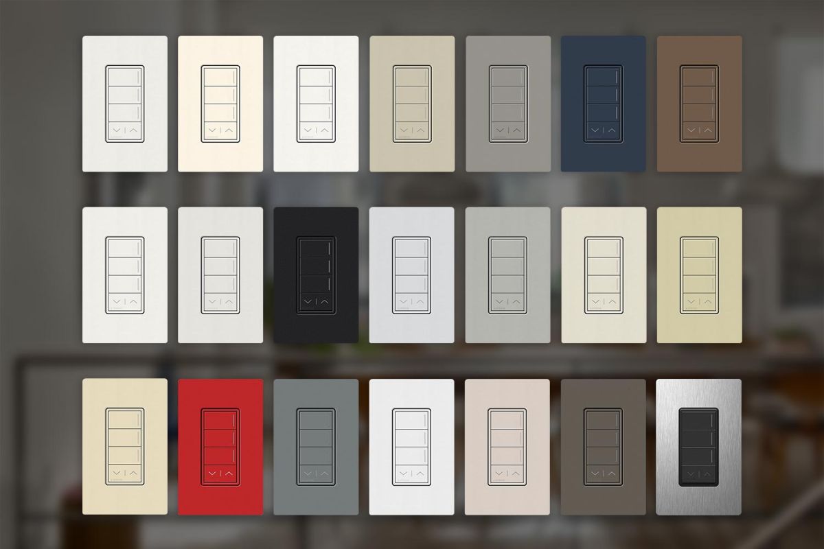 A variety of light switch plates in different colors arranged in a grid.