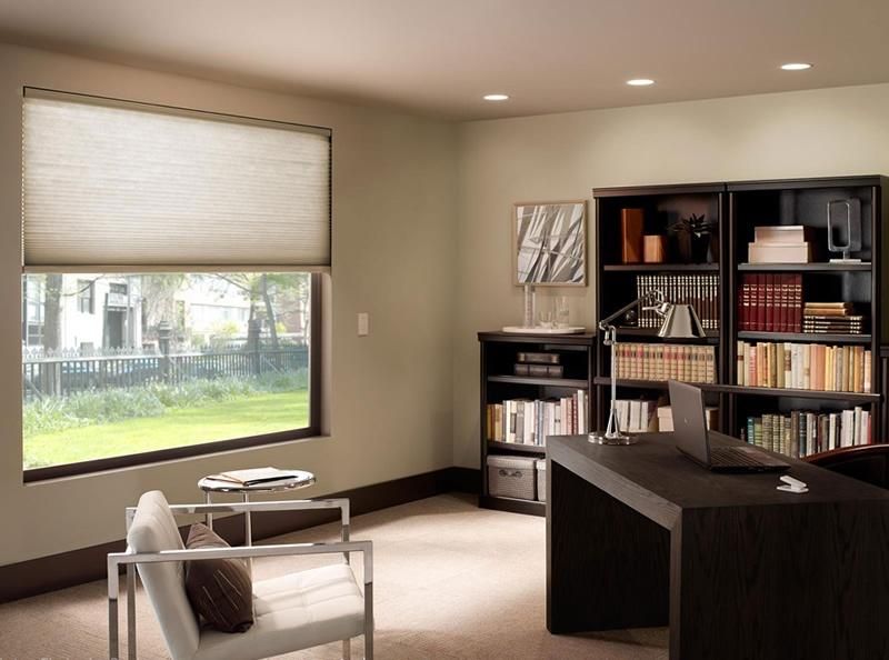 Modern office with a sleek Lutron shading system, providing quiet operation and efficient light control.